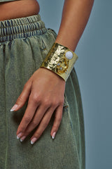 LISTEN CLOSELY METAL CUFF IN GOLD