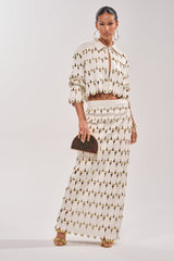 THE SNEAK PEEK STUDDED PU MIDI SKIRT IN WHITE
