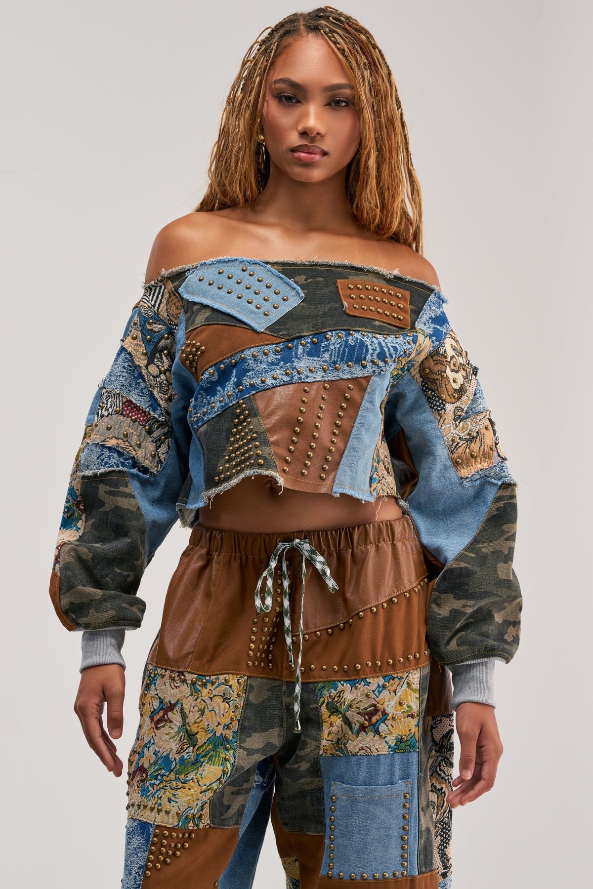 CALL ME CRAZY PATCHWORK OFF THE SHOULDER SWEATSHIRT IN BROWN MULTI